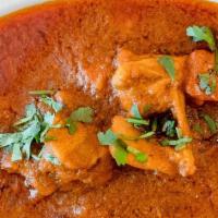 Chicken Curry · Chicken pieces cooked with fresh herbs and spices.