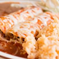#28. Two Enchiladas · Corn tortillas stuffed with your choice of carnitas, chicken, cheese or shredded beef mild, ...