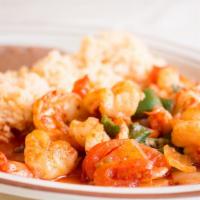 #32. Camarones Rancheros · Shrimp with tomatoes onions and jalapeno and red sauce.