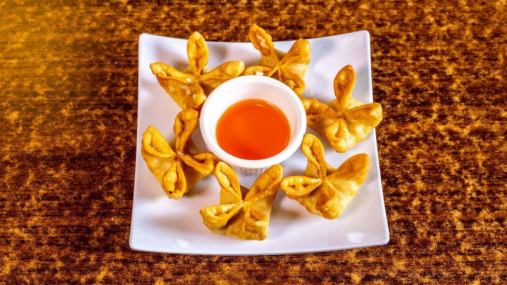 Crab Cheese Wonton(6) · Crispy wontons filled with a creamy mixture of crab meat, green onions.