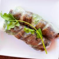 Grilled Pork Sausage Spring Rolls (2 Rolls) / Goi Coun Nem Nuong · Grill Pork Sausage, crunchy wrap, fresh lettuce, mint, cilantro, shredded pickled carrots & ...