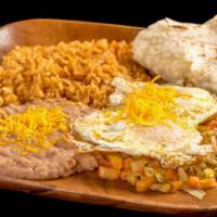 Huevos Rancheros · Two eggs over easy with pico de gallo.