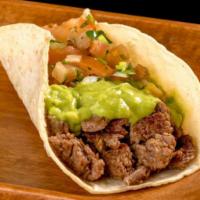 18 Two Carne Asada Tacos · Two carne asada tacos (steak) topped with guacamole and pico de gallo. Served with rice and ...