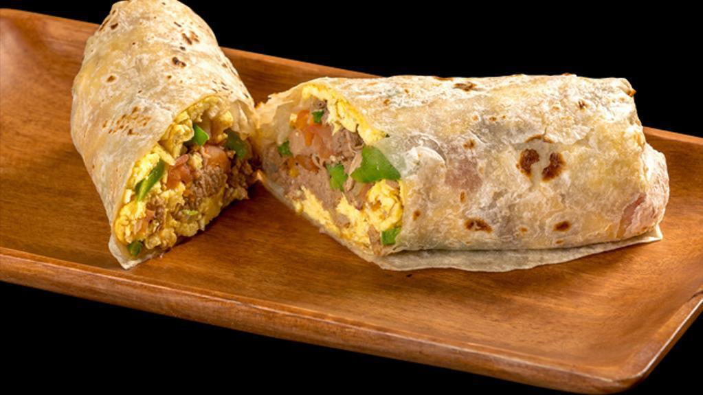 Machaca Burrito · Shredded beef bell pepper & onion.