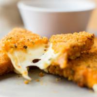 Dip Sticks · Mozzarella cheese dipped in seasoned bread
crumbs, with marinara.
