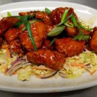 Boneless Honey Sriracha Wings · Sweet and Spicy| Slaw| Ranch or Blue Cheese