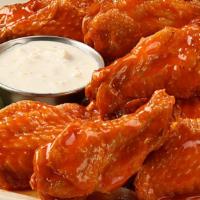 Bone-In Buffalo Wings · Traditional spicy wings| Blue cheese | or ranch
