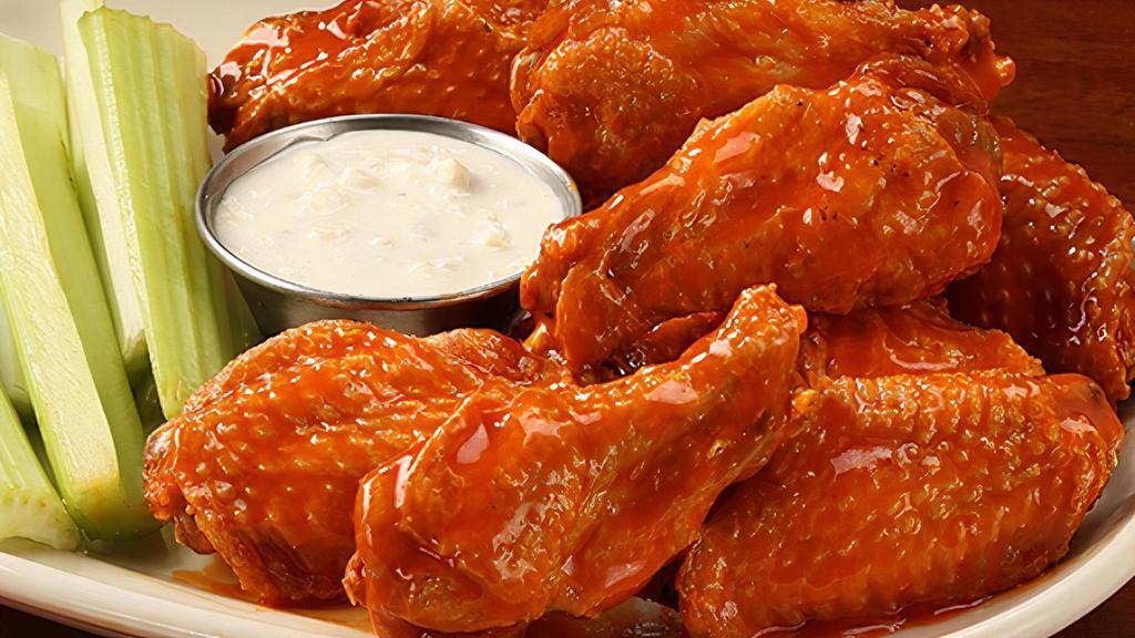 Bone-In Buffalo Wings · Traditional spicy wings| Blue cheese | or ranch