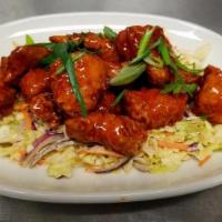 Bone-In Honey Sriracha Wings · Spicy and Sweet Wings |Slaw| Blue cheese | or ranch