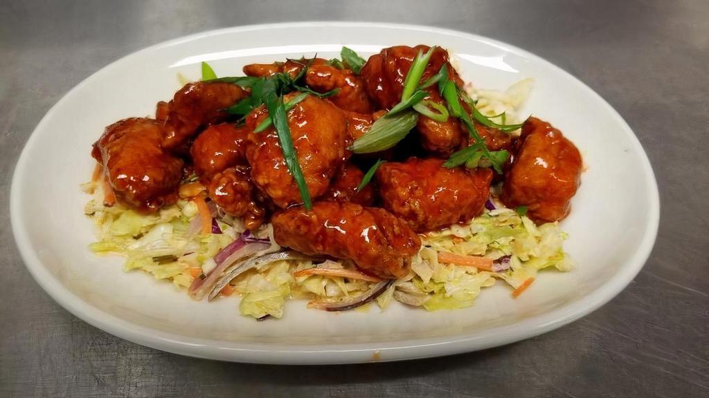 Bone-In Honey Sriracha Wings · Spicy and Sweet Wings |Slaw| Blue cheese | or ranch