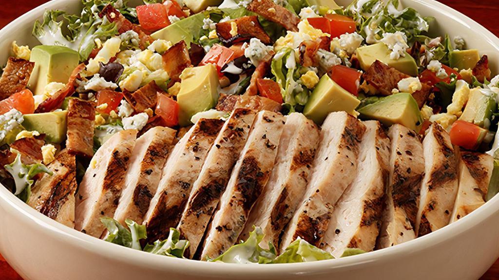 Tossed Chicken Cobb · Sliced Grilled Chicken Breast | Avocado | chopped bacon | boiled egg | blue cheese | tomato | mixed greens | blue cheese dressing