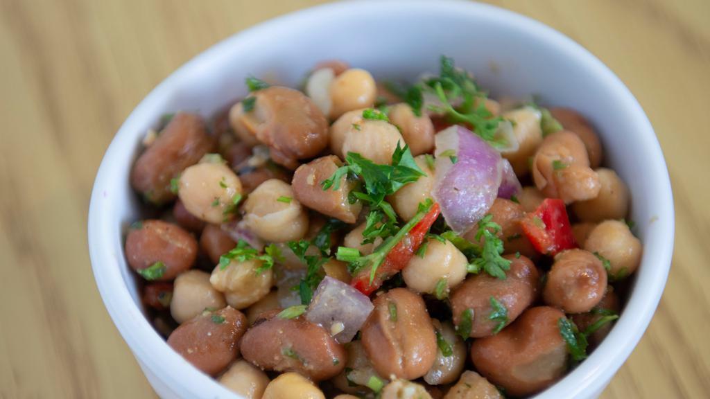 Mixed Beans · Vegan. Gluten free.  
fava beans, garbanzo beans, parsley, garlic, olive oil and lemon juice.