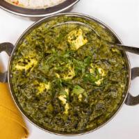 Saag Paneer (D) · house- made cheese, spinach, cream & ground spices