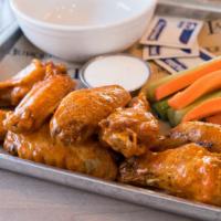 Crispy Wings · Fried wings with sauce choice(tossed or on the side). Comes with carrots/celery and ranch or...