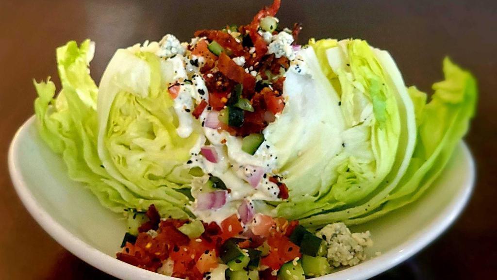 The Wedge- Gf · iceberg lettuce / blue cheese dressing / candied bacon tomato / cucumber / red onion / blue cheese crumbles everything spice