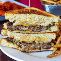 The Patty Melt · all-natural thin and crispy smashed beef patty / mustard onions / Texas toast / American che...