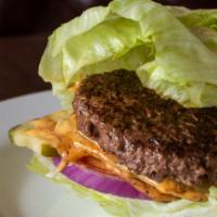 Paleo Grass Fed · grass fed beef patty / tomato / red onion / pickle / special sauce / iceberg “bun”