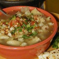 Menudo White · Delicious Red or  White Menudo served with a Flour Tortilla, Lemons, Cilantro, Crushed Red P...