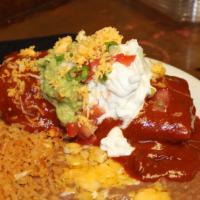 Chimichanga Complete Dinner · Chimichanga Enchilada Style, Guacamole, Sour Cream, Beans, Rice