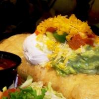 Chimichanga Deluxe · Deep Fried Burrito Topped with Sour Cream and Guacamole  Topped Enchilada Style
 Option