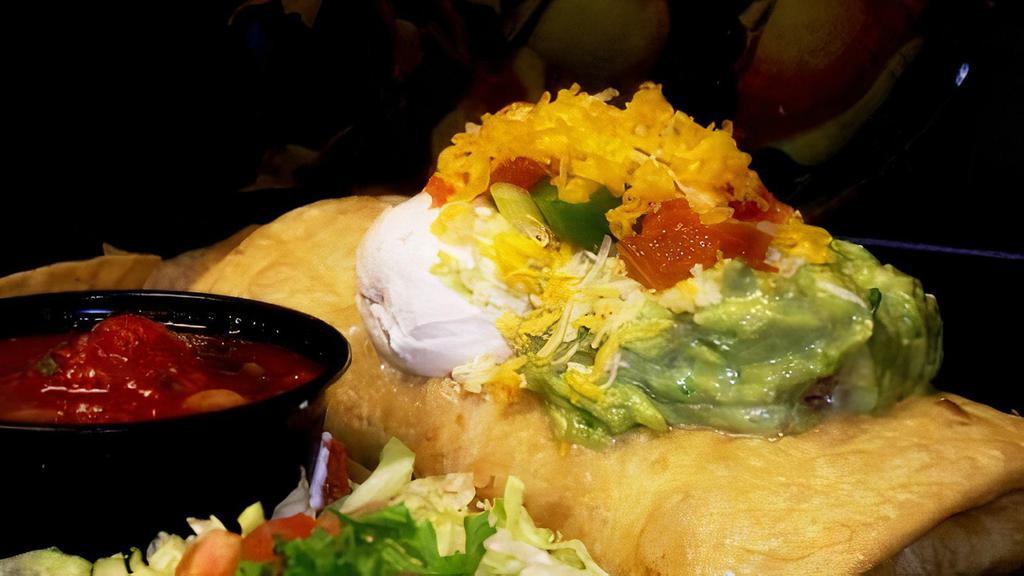 Chimichanga Deluxe · Deep Fried Burrito Topped with Sour Cream and Guacamole  Topped Enchilada Style
 Option