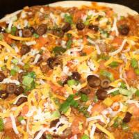 Large Mexican Pizza · Two Toasted Tortillas, Cheese, topped with Red Sauce, Ground Beef, Tomatoes, Onions, More Ch...