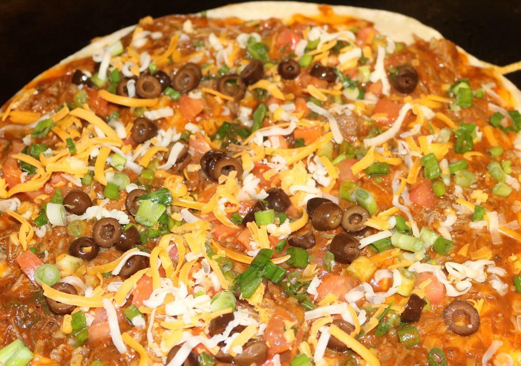 Large Mexican Pizza · Two Toasted Tortillas, Cheese, topped with Red Sauce, Ground Beef, Tomatoes, Onions, More Cheese, Black Olives