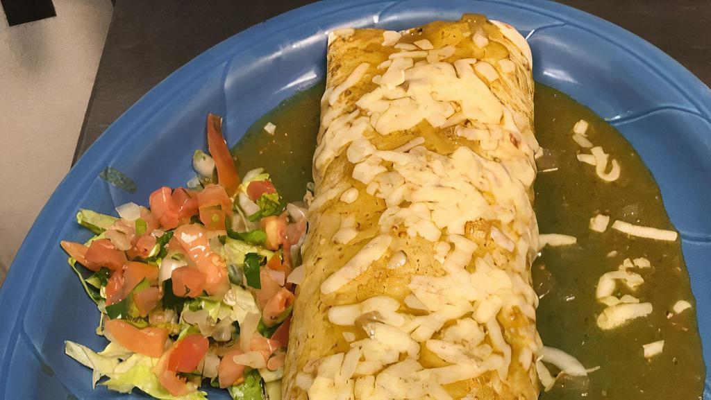 Chile Verde Burrito  · A flour tortilla filled with pork chile verde, Spanish rice and refried beans. Topped with melted cheese and green salsa.