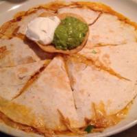 Meat Quesadilla · Large flour tortilla with choice of meat, melted cheese, served with sour cream, guacamole, ...