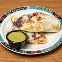 Potato Burrito · 12” flour tortilla, our crisp af potatoes, black beans, monterey jack, and house sauce.