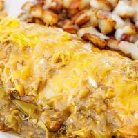 Hunk ‘A Burnin’ Love · 3 scrambled eggs, homemade tortilla, cheddar cheese with ham, bacon or chicken and smothered...