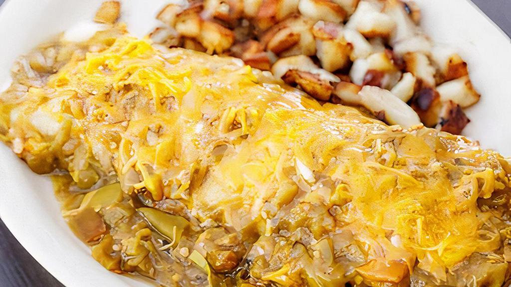 Hunk ‘A Burnin’ Love · 3 scrambled eggs, homemade tortilla, cheddar cheese with ham, bacon or chicken and smothered with green chile sauce and cheese. served with hash brown potatoes.