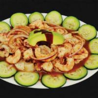 Special Platter · Cooked shrimp, shrimp cooked in lime juice, octopus, scallops, cucumber, onion, avocado and ...