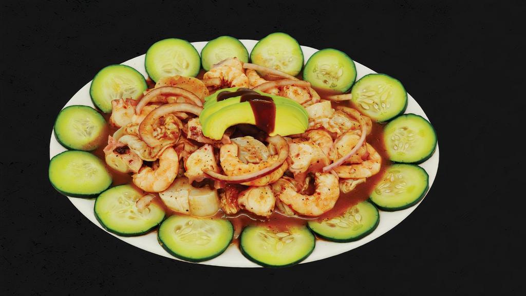 Special Platter · Cooked shrimp, shrimp cooked in lime juice, octopus, scallops, cucumber, onion, avocado and black sauce.