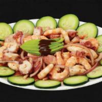 Shrimp & Octopus Platter · Cooked shrimp, octopus, cucumber, onion, avocado and black sauce.