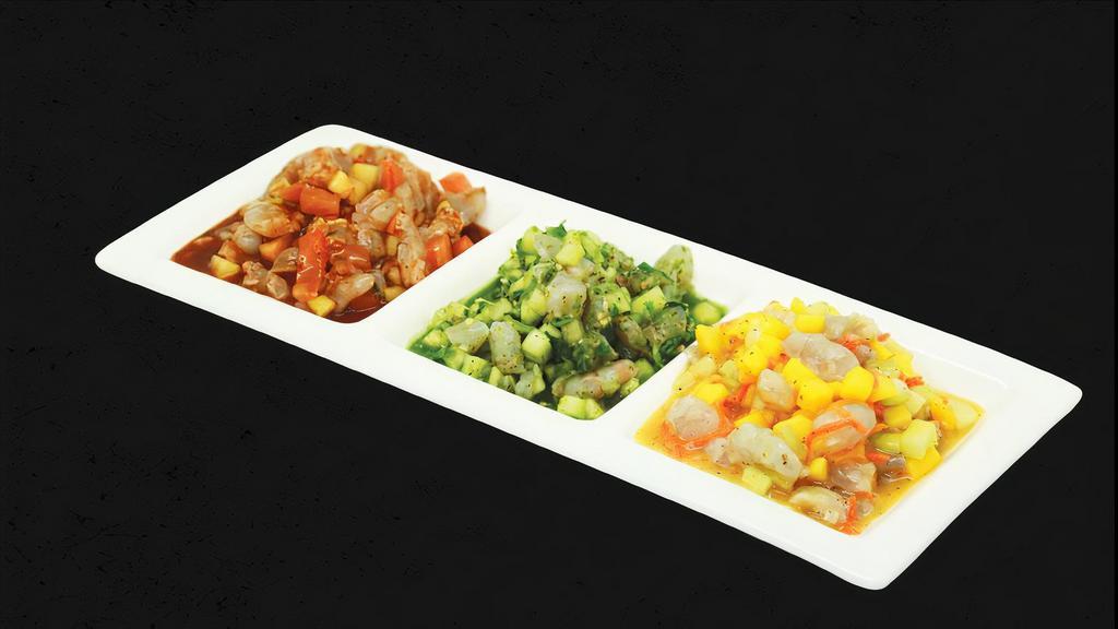 Ceviche Trio · Shrimp cooked in lime juice in three different ceviche styles (altata style, black sauce ceviche and hulk).
