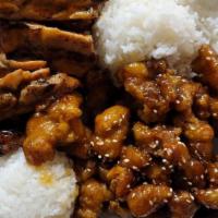 Chicken & Honey Sesame Chicken · Served with steamed rice and salad.