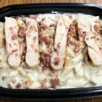 Chicken Mac & Cheese Meal · White cheddar macaroni and cheese topped with all white meat chicken and bacon bits.