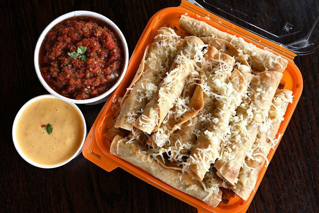 Taquito Box · Each taquito box is 20 taquitos and feeds 10 people. Comes with your choice of salsa and guac, queso OR sour cream. Requires 24 hours advance notice.