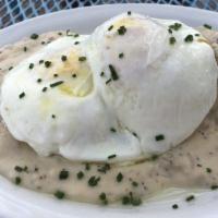 Biscuit & Gravy · Fresh baked biscuit smothered in our signature country sausage gravy. Add an egg at an addit...