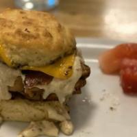 Big Jim · Signature country sausage gravy, melted cheddar, applewood smoked bacon. Add an egg at an ad...