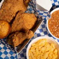 1 Meat - 2 Sides · BBQ plate with your choice of (1) meat and (2) sides.