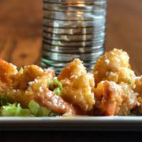 Boom Boom Shrimp · Panko coated jumbo shrimp, flash fried and tossed in a sweet chili and garlic sauce.