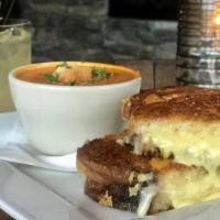 Grilled Cheese & Tomato Soup · Extra sharp Tillamook white cheddar grilled on artisan sourdough bread and served with a cup...