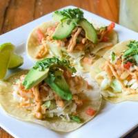 Grilled Fish Tacos · Three grilled cod tacos with our spicy slaw, pico de gallo, chipotle mayo and stuffed in a g...