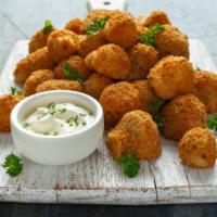 Breaded Mushrooms · Fresh mushrooms, battered and fried to perfection.