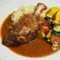 Lamb Shank · Slow roasted and tender until it falls off the bone.