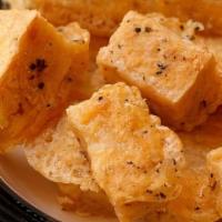 Fried Tofu · Deep fried white tofu to golden brown soft inside and crispy outside served with sweet and s...