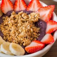 Classic Bowl · Organic Acai blended with coconut milk and banana topped with fresh strawberry, sliced banan...