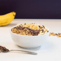 Cacao Bowl · Organic Acai blended with coconut milk and banana topped with fresh sliced banana, organic c...